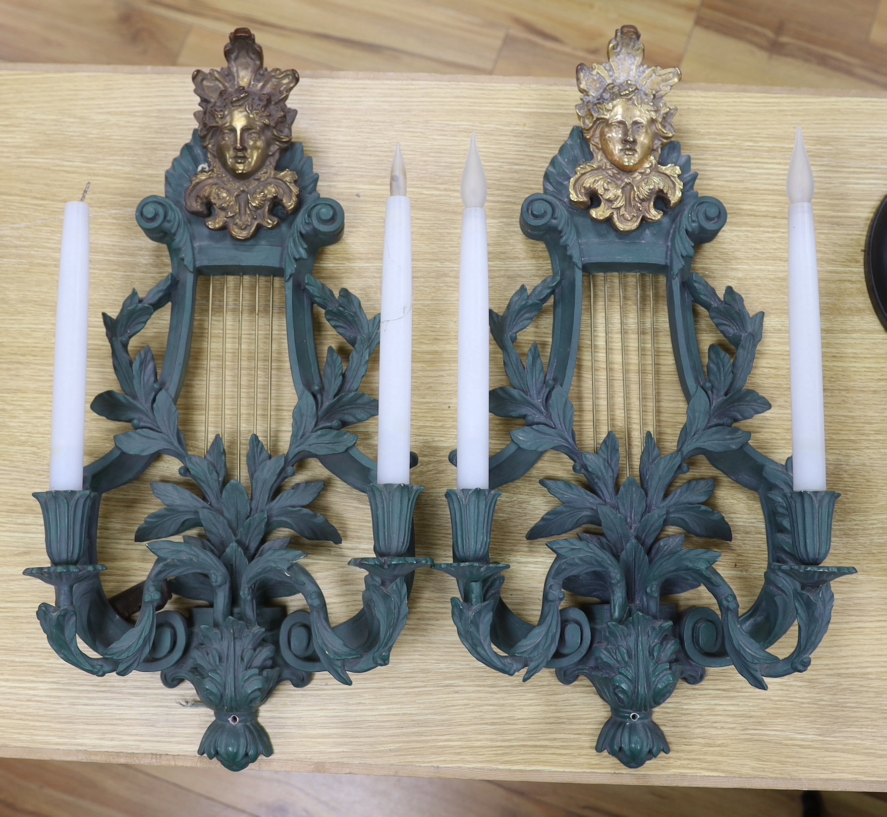 A pair of lyre shaped green resin wall lights, height 62cm